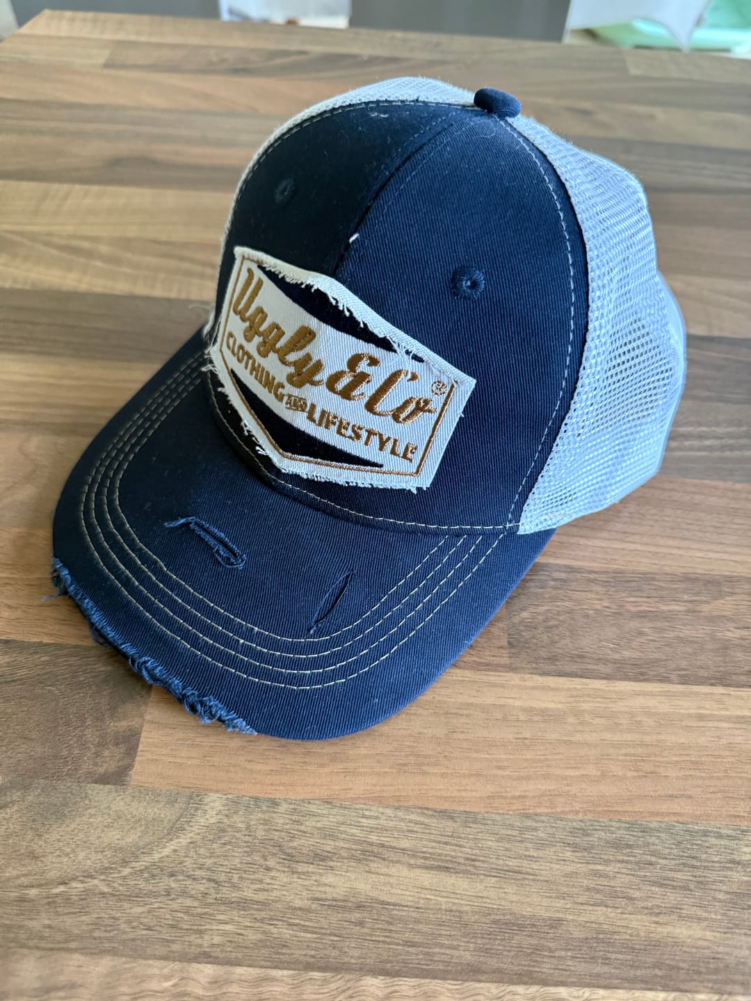 Customer photo review of Night Blue & Gold Diamond Trucker Hat