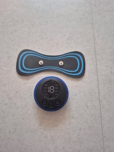 Customer photo review of Masajeador muscular portátil