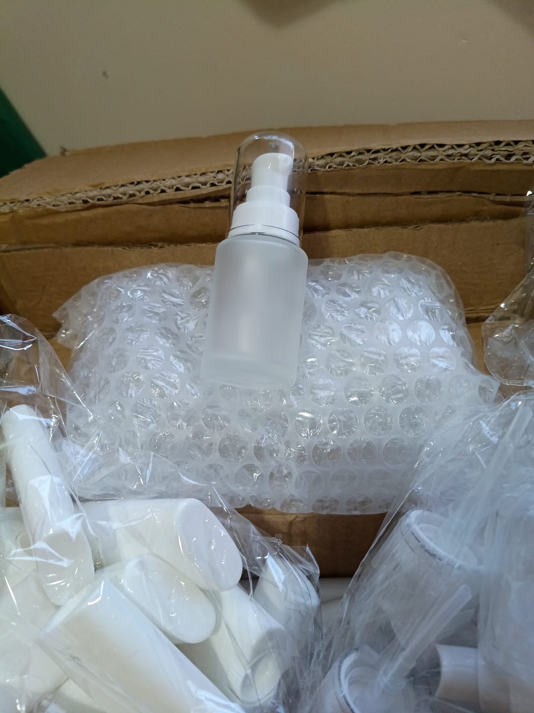 Customer photo review of Botella 30 ml empavonada vidrio transparente recto tapa ovalada