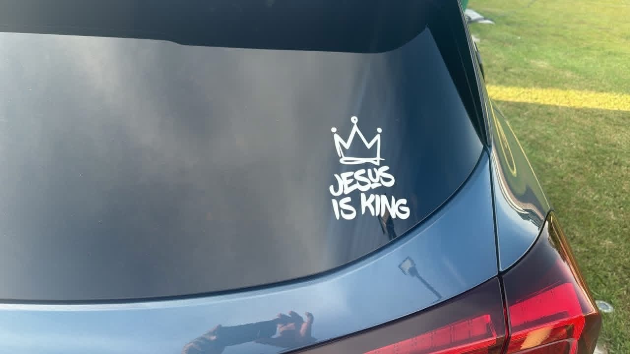 Customer photo review of Christianartworkshop Jesus Is King Crown Accent Car Sticker: Durable Decor for Faith-Filled Commutes