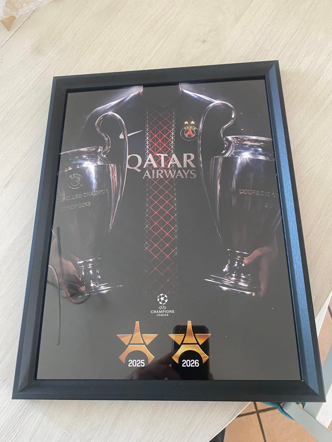 Customer photo review of Cadre Photo PSG – Back 2 Back Champions League 2025 & 2026 | Deux Trophées