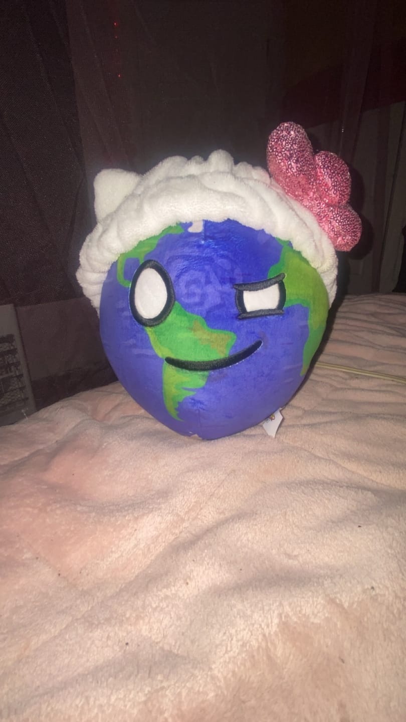 Customer photo review of The SolarBalls Earth Plush