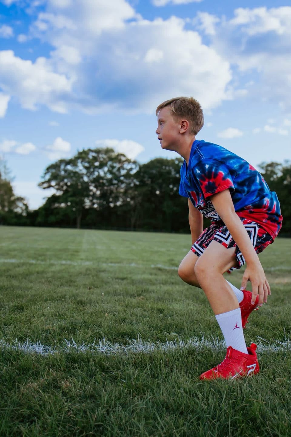 Customer photo review of Phenom Elite Quantum Speed 2.0 Football Cleats - Red