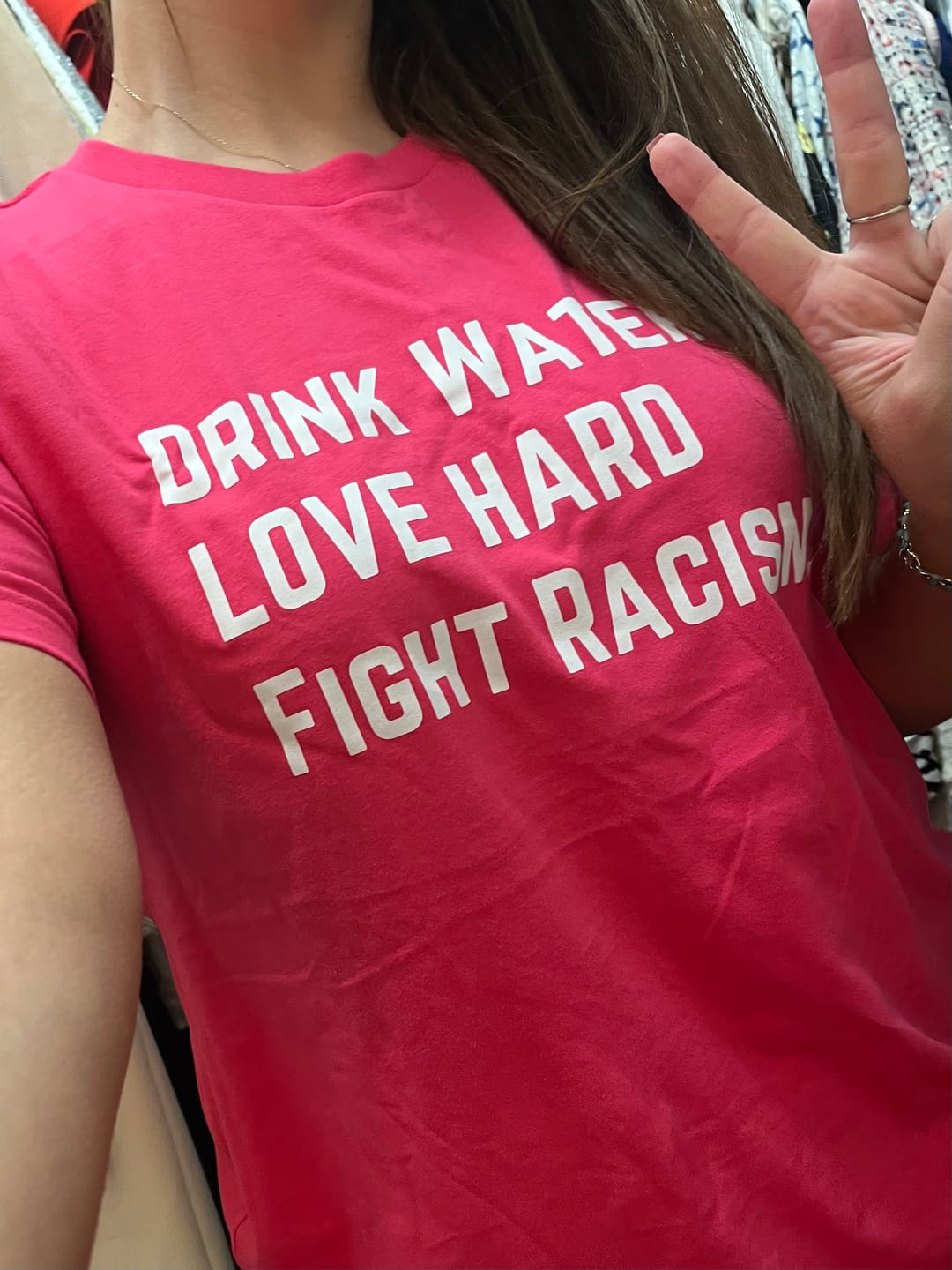 Customer photo review of Drink Water Fight Racism Unisex T-shirt