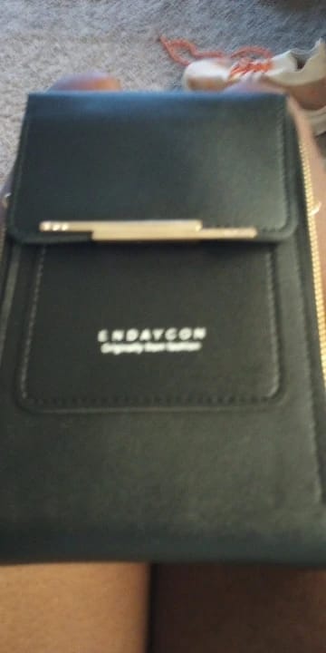 Customer photo review of SecureTouch Crossbody Shoulder Bag