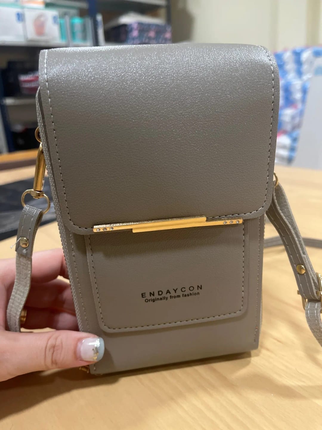 Customer photo review of SecureTouch Crossbody Shoulder Bag