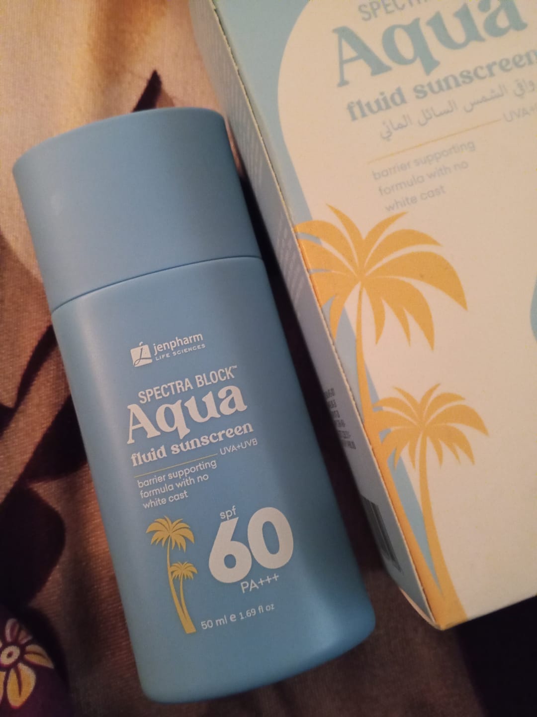 Customer photo review of Spectra Block Aqua Fluid Sunscreen SPF 60 PA+++