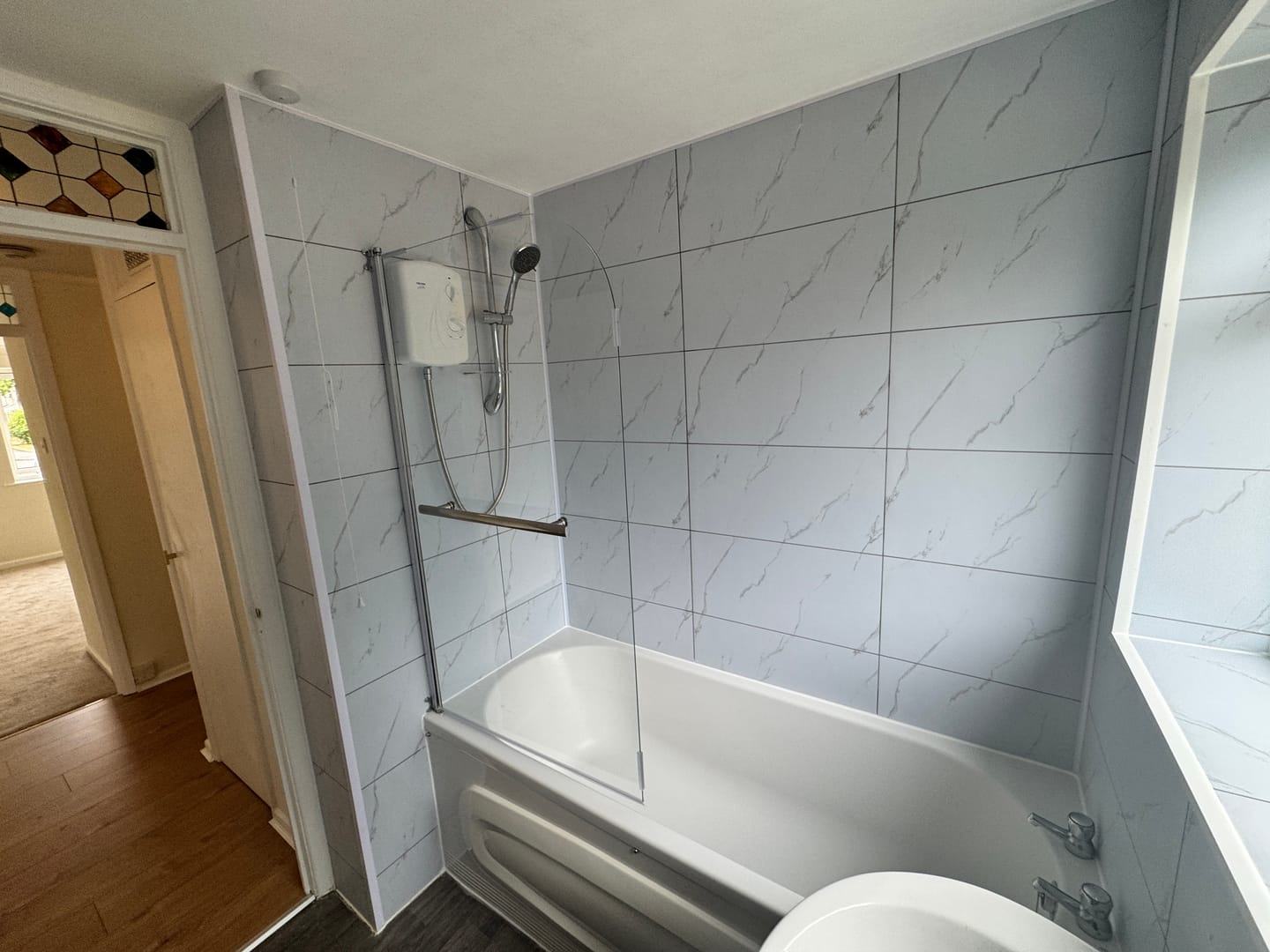 Customer photo review of Premium Carrara White Marble Matt Shower Wall Panel – 2.6M x 600MM