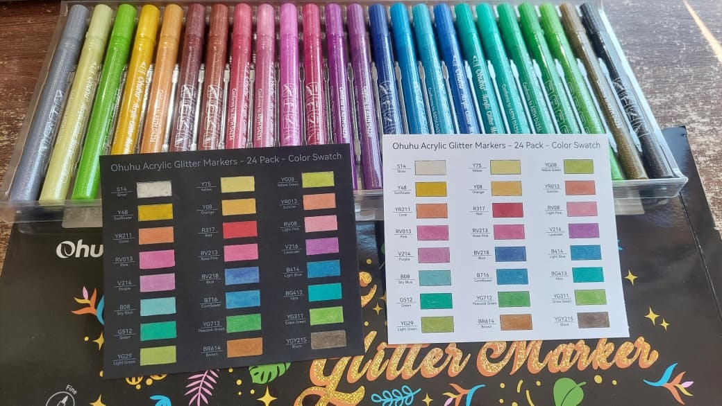Customer photo review of Ohuhu - Set 24 Marcadores Acrílicos Glitter 0.7 mm