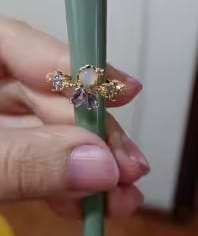 Customer photo review of Adjustable Enchanted Sun Ring with Iridescent Stone