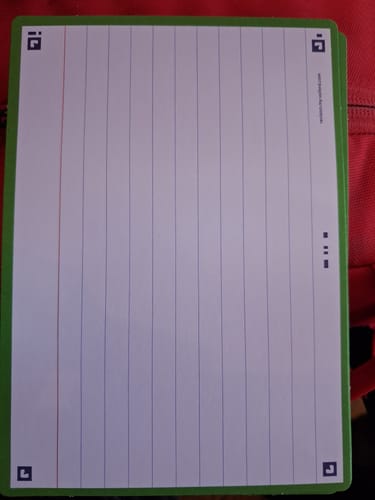 Customer's FLASH 2.0 Oxford flashcard with green border and lined white paper showing corner scanning marks.