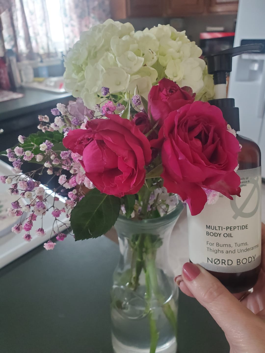 Customer photo review of NØRD BODY Peptide Body Oil
