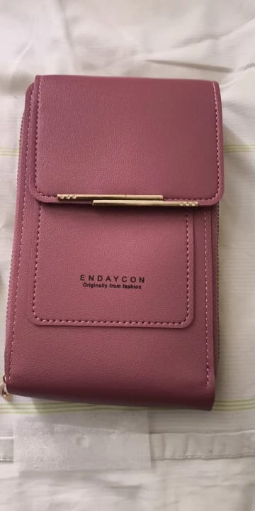 Customer photo review of SecureTouch Crossbody Shoulder Bag