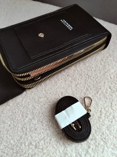 Customer photo review of SecureTouch Crossbody Shoulder Bag