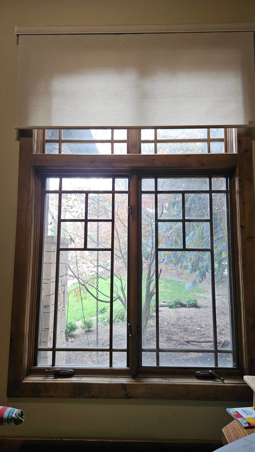 Customer photo review of SmartWings Motorized Light Filtering Roller Shades 70% Blackout Safari