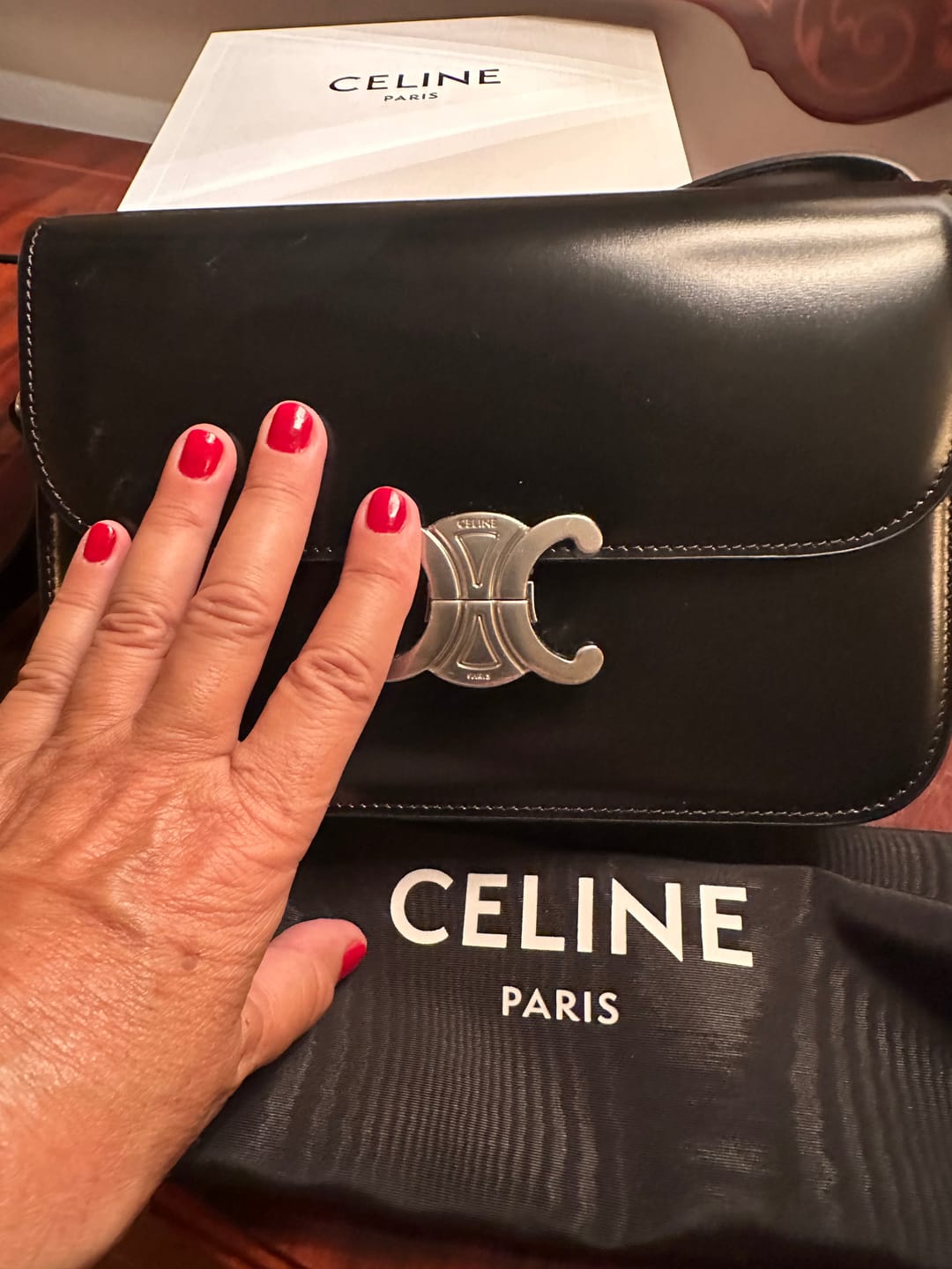 Customer photo review of classique triomphe 22 black calfskin silver hardware