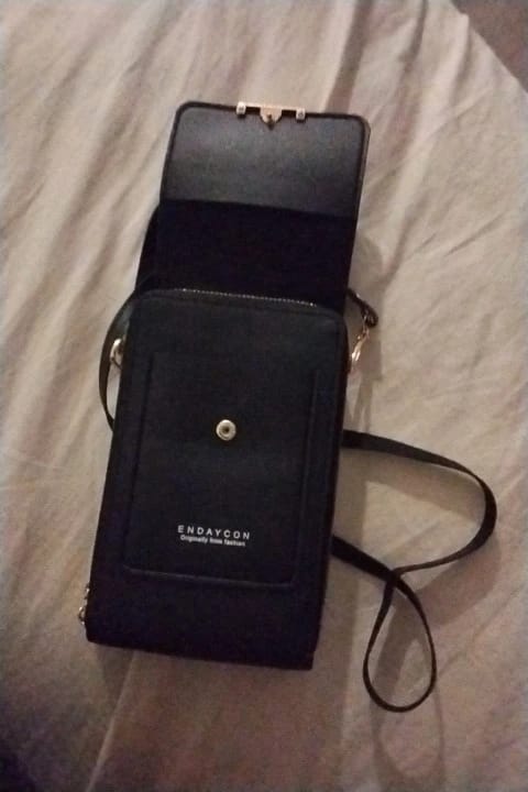 Customer photo review of SecureTouch Crossbody Shoulder Bag