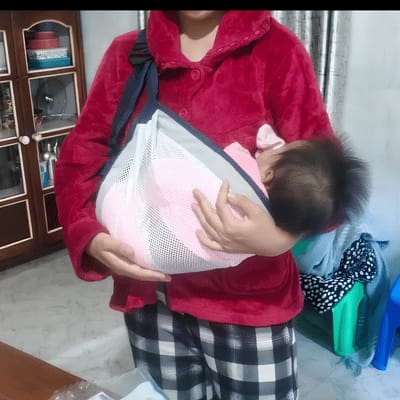Customer photo review of MaamaNest CloudCarry™ | Pain-Free Baby Sling Carrier