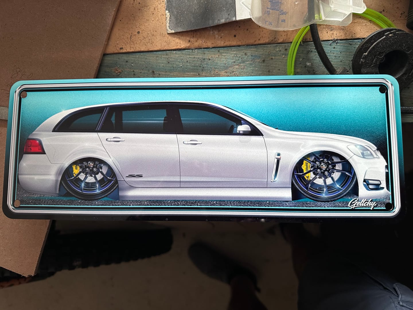 Customer photo review of VE Commodore Wagon Number Plate Sign – Sting Red Man Cave Wall Decor