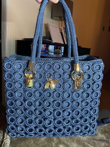 Customer's Garden Bee Crochet Bag Kit with custom-made blue handles and gold bee charm.