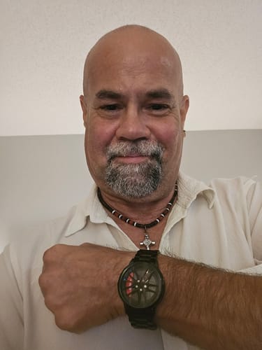 Customer's GR Supra J29 watch on wrist, featuring a black wheel design with a visible red brake caliper.