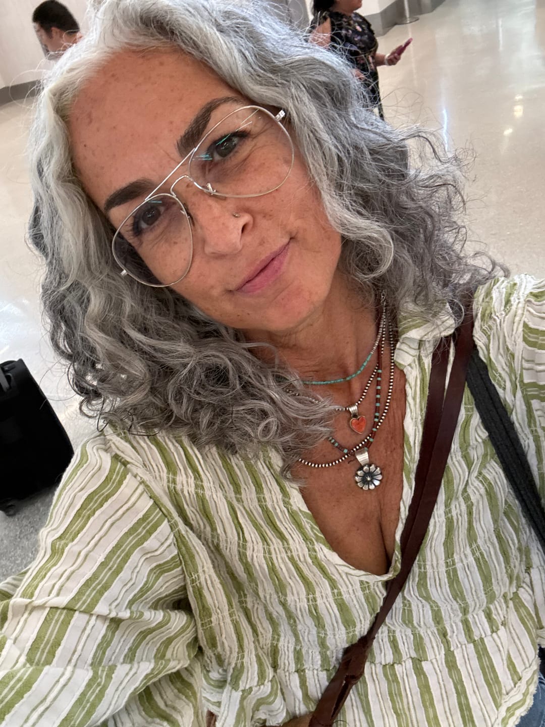 Customer photo review of Handcrafted Sterling Silver Flower Pendant by Chimney Butte