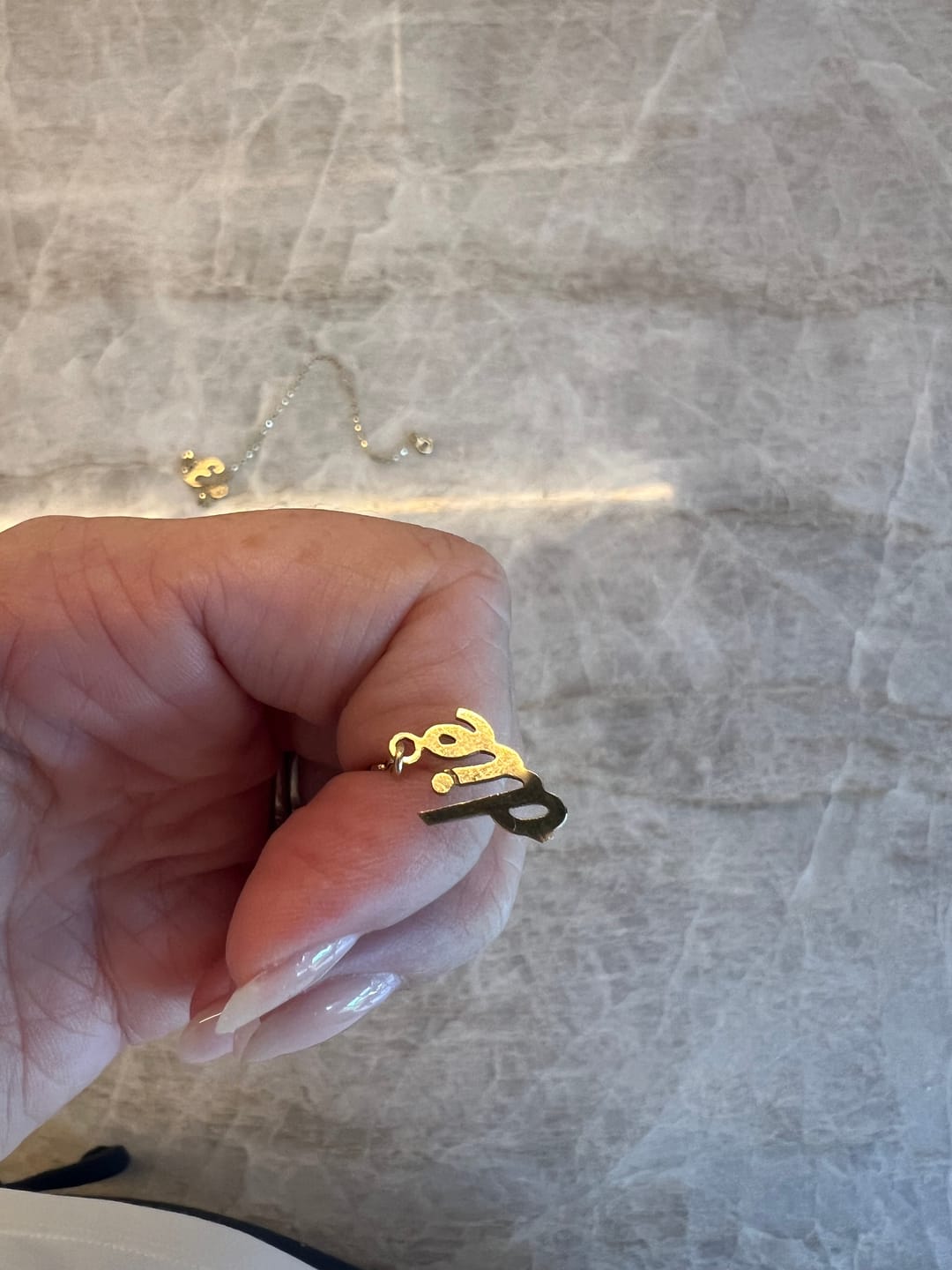 Customer photo review of 9ct Gold Script Name Necklace (1-6 Letters)