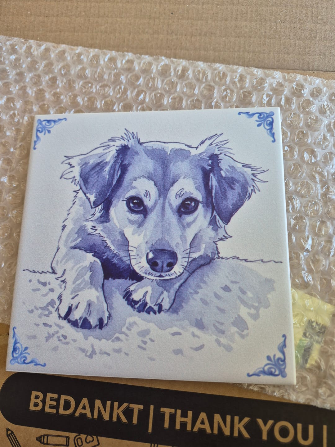 Customer photo review of Delfts Blauw tegeltje bedrukken met jouw eigen huisdier