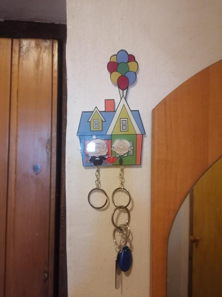Customer photo review of Chaveiros combinando estilo desenho animado