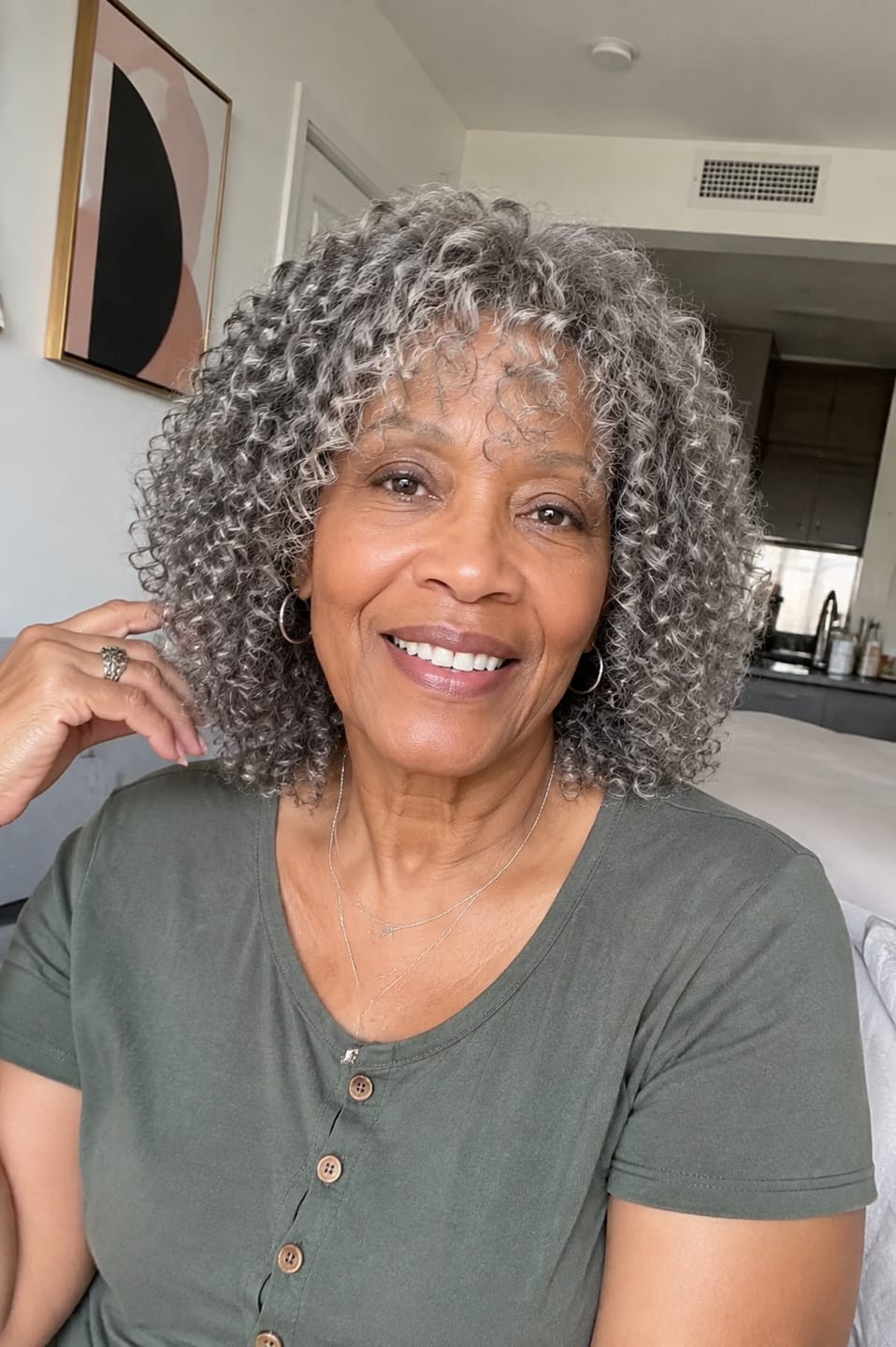 Customer photo review of Luvwin Salt And Pepper Defined Curls Wig With Bangs