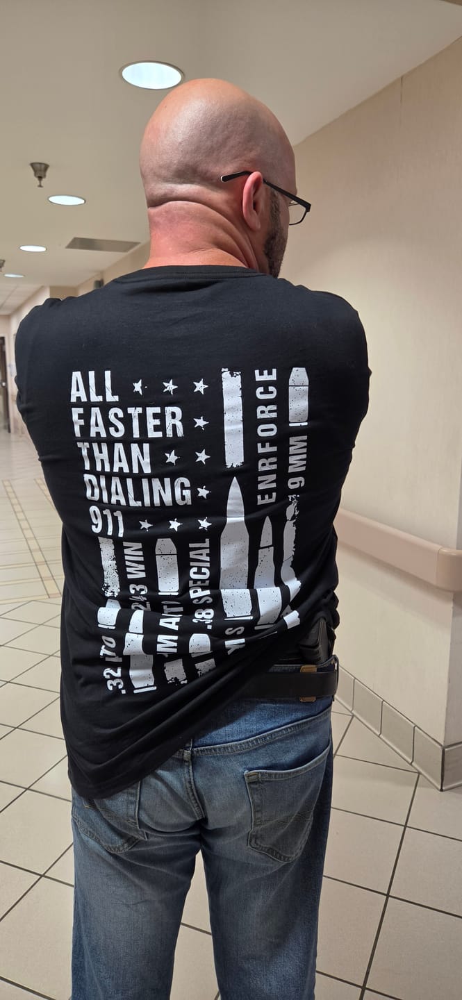 Customer photo review of All Faster Than Dialing 911 Tee