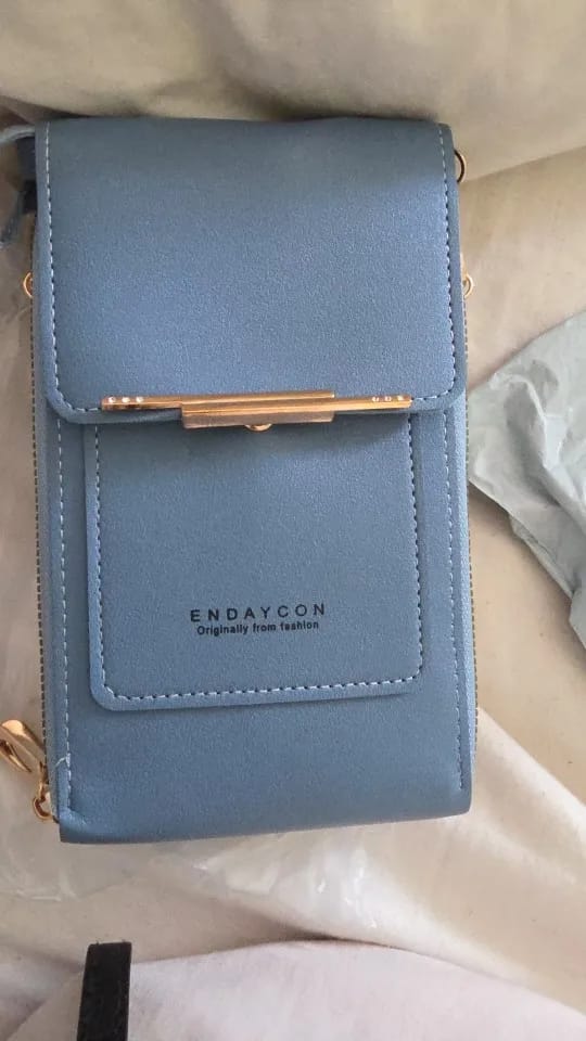 Customer photo review of SecureTouch Crossbody Shoulder Bag