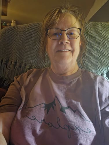 Customer's Explore Heart Beat T-shirt, a relaxed mauve cotton tee with black graphic print, worn by reviewer.