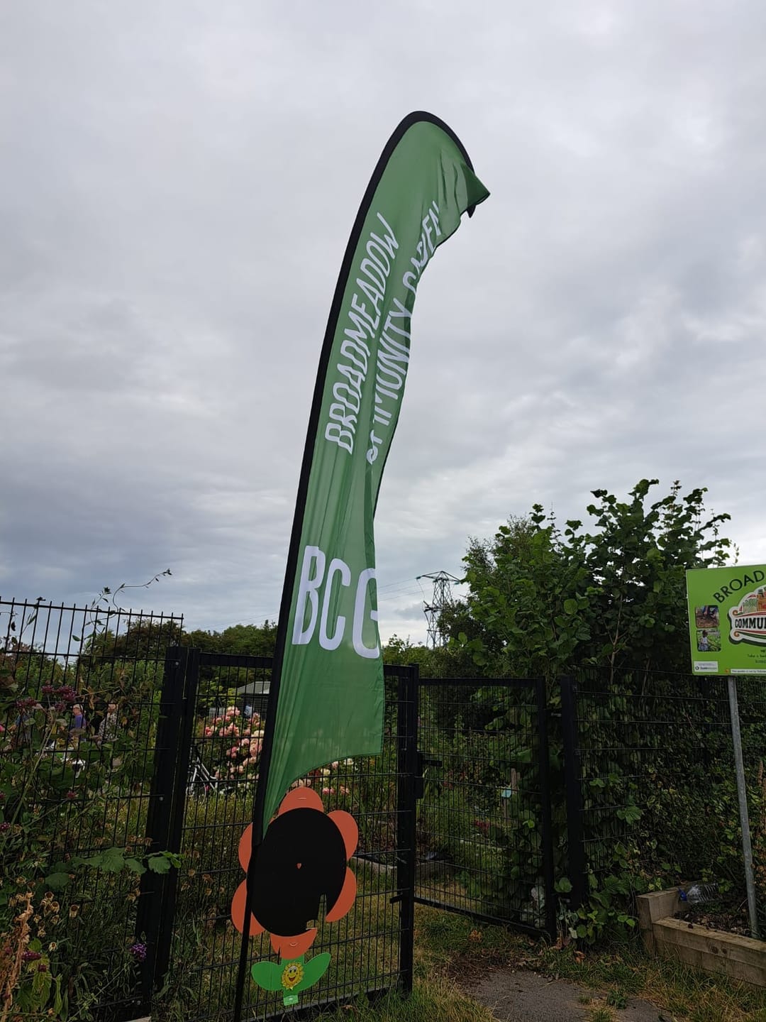 Customer photo review of Large 4m Custom Feather Banner Package – Banner, Pole & Base