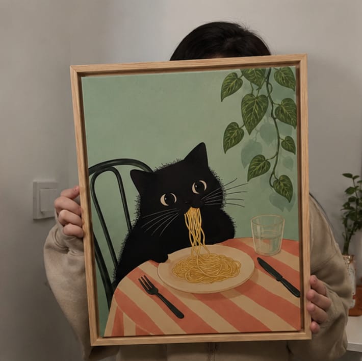 Customer photo review of Black Cat Eating Spaghetti Canvas Wall Art