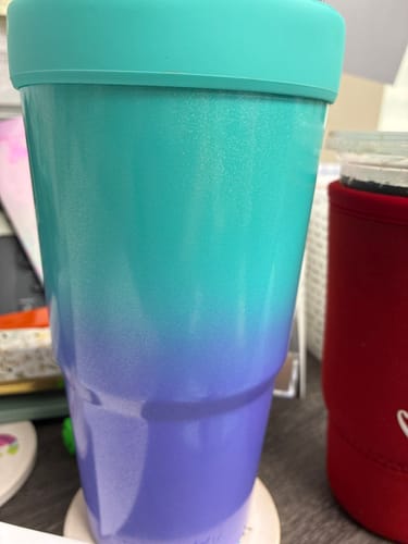 Customer's To-Go Buddy tumbler with a teal-to-purple ombre finish and a matching teal lid.