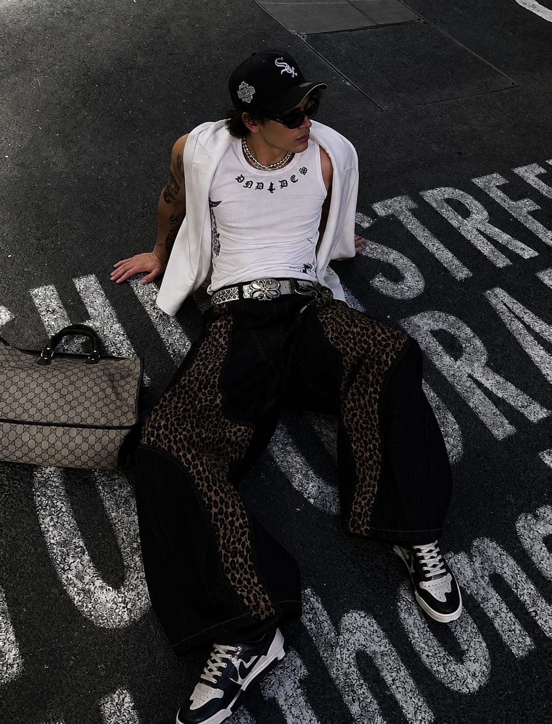 Customer photo review of Cross-Paneled Genuine Haircalf Leopard Leather Curved Baggy Jeans