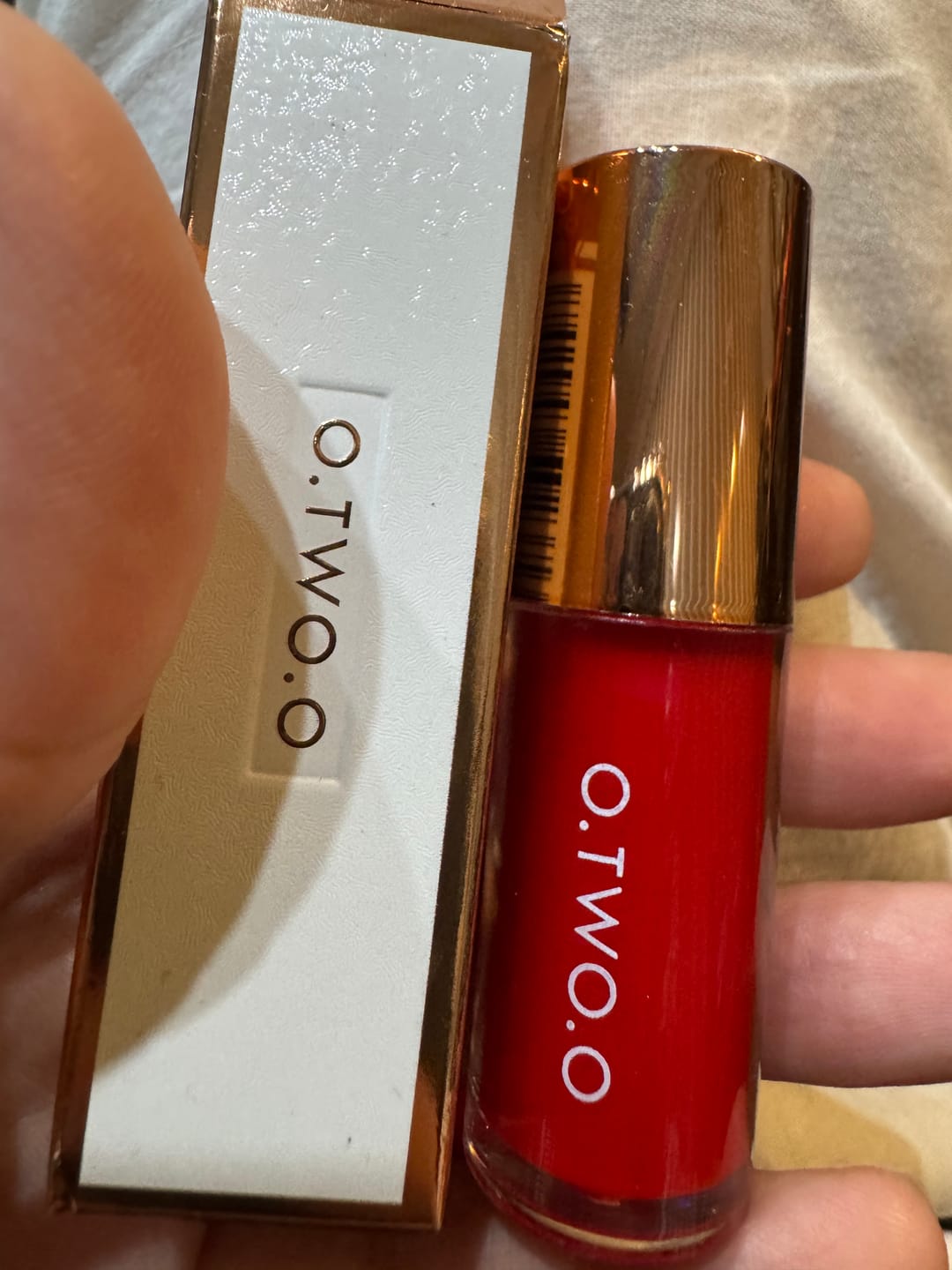 Customer photo review of O.TWO.O PLUMP SHINY CRYSTAL LIP GLOSS