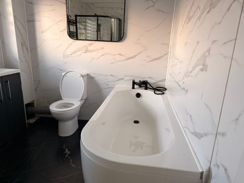 Customer photo review of J - Shaped Corner Bath & Panel - 1700 x 750mm Left Hand