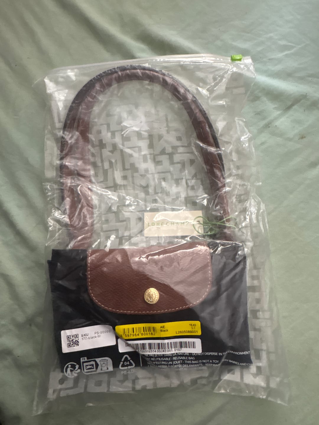 Customer photo review of Aisling - Bolso de Mano Clásico Plegable