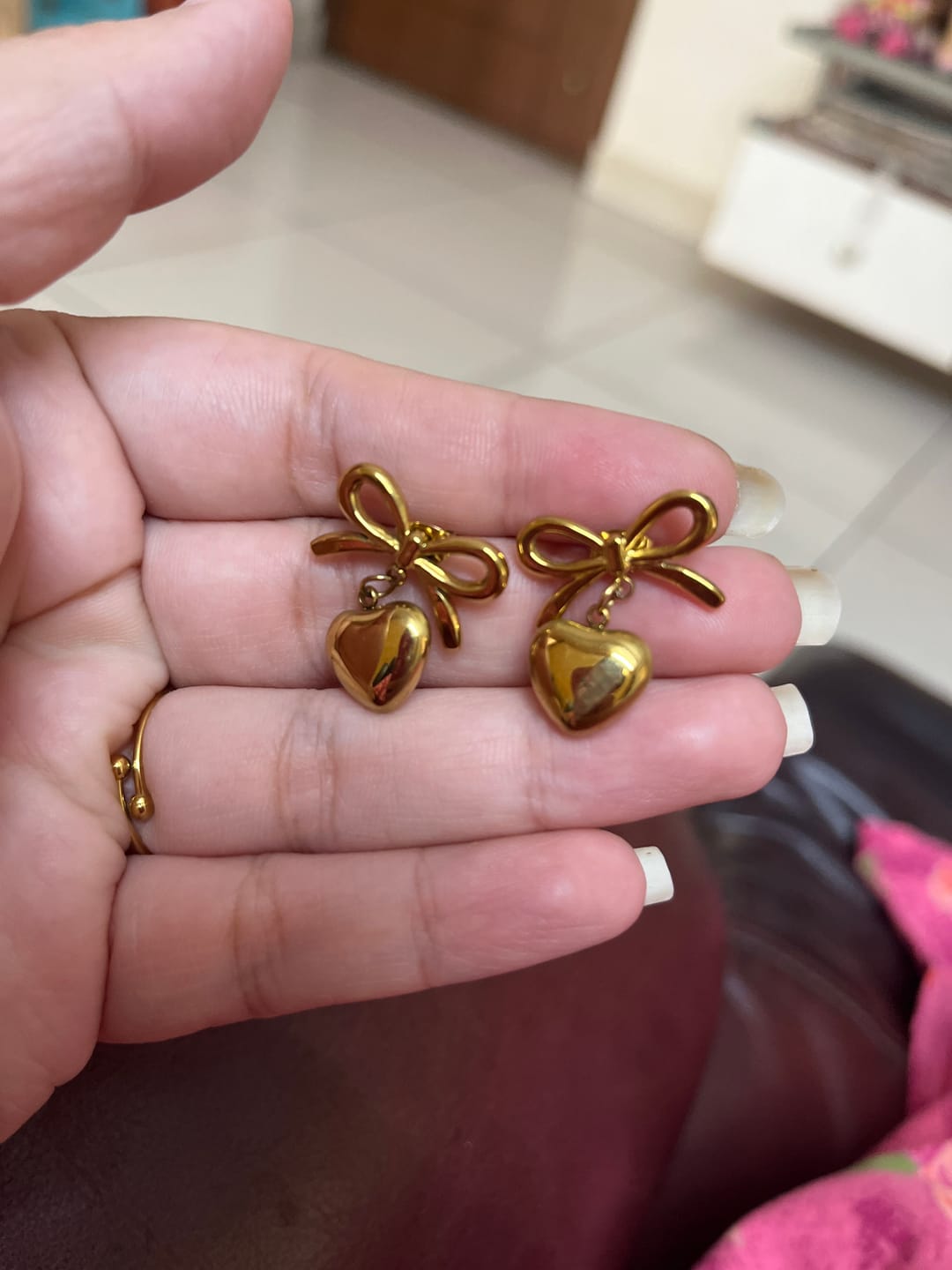 Customer photo review of Wrapped With Love Heart Earrings