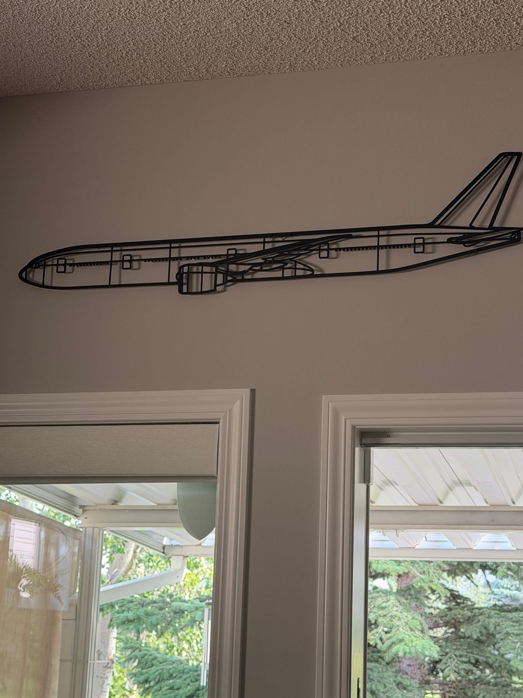 Customer photo review of 777-300ER Silhouette Metal Wall Art