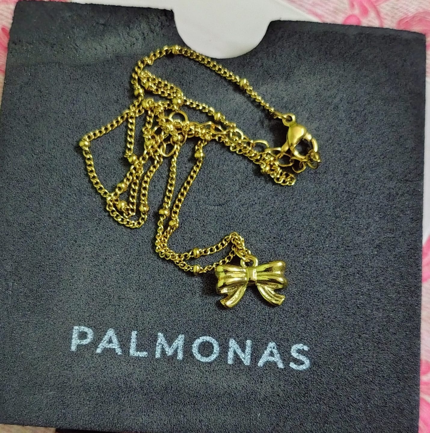 Customer photo review of Bow Pendant Necklace