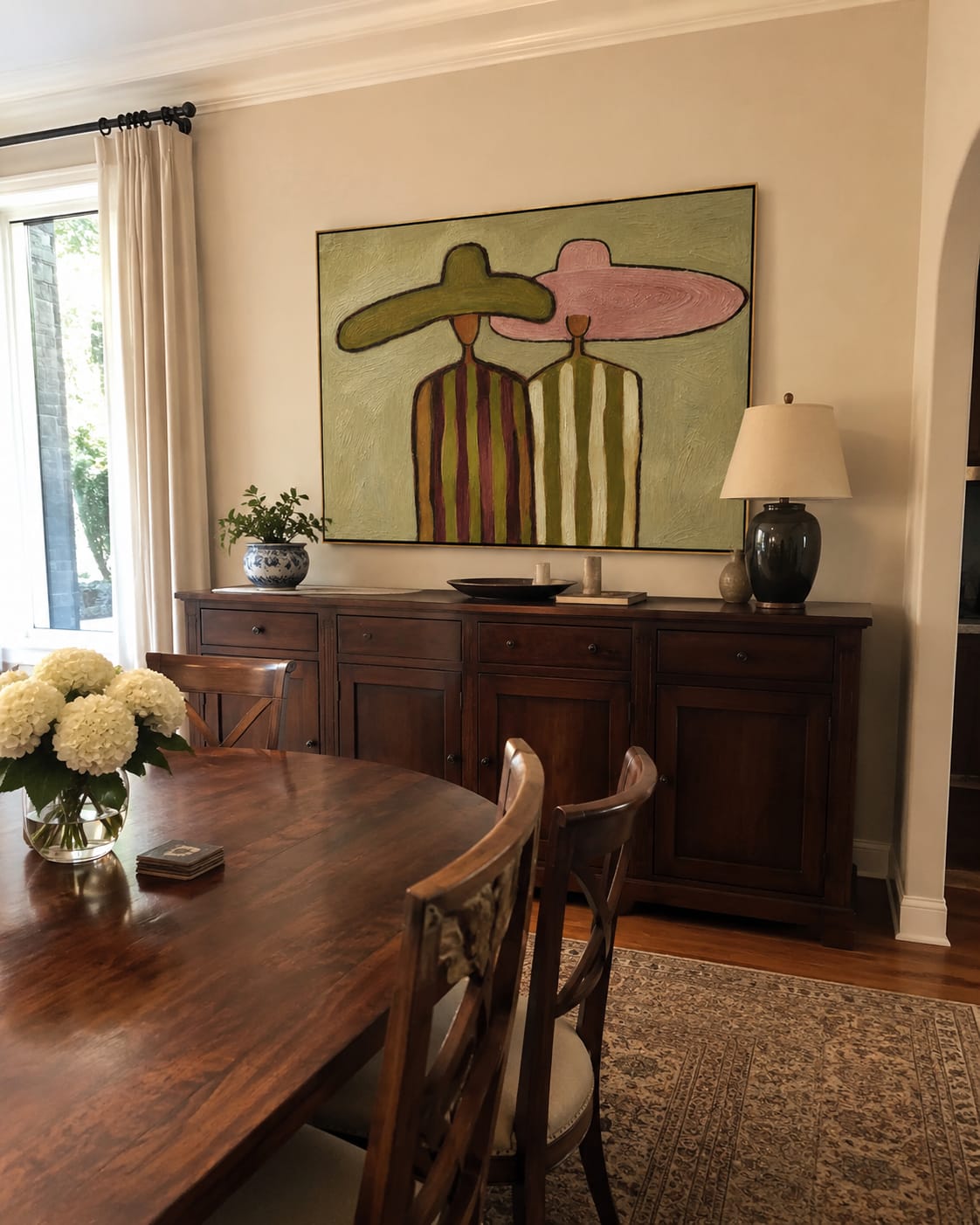 Customer photo review of Sage & Rose – Vintage Americana Two Figures in Sombreros Painting | Colorful Folk Art Living Room Art