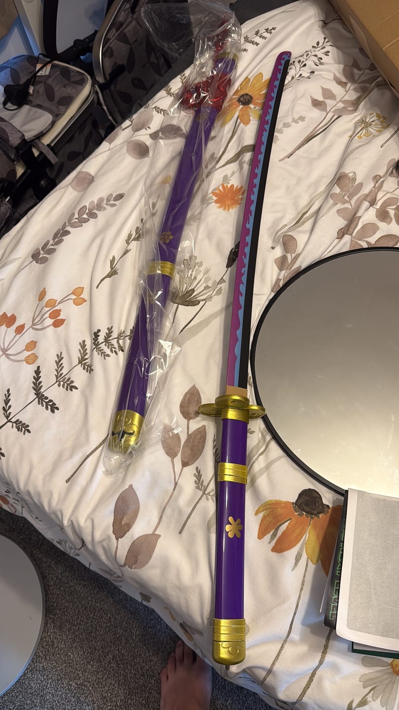 Customer photo review of One Piece Sword Roronoa Zoro Enma Purple Katana Wooden Cosplay Sword