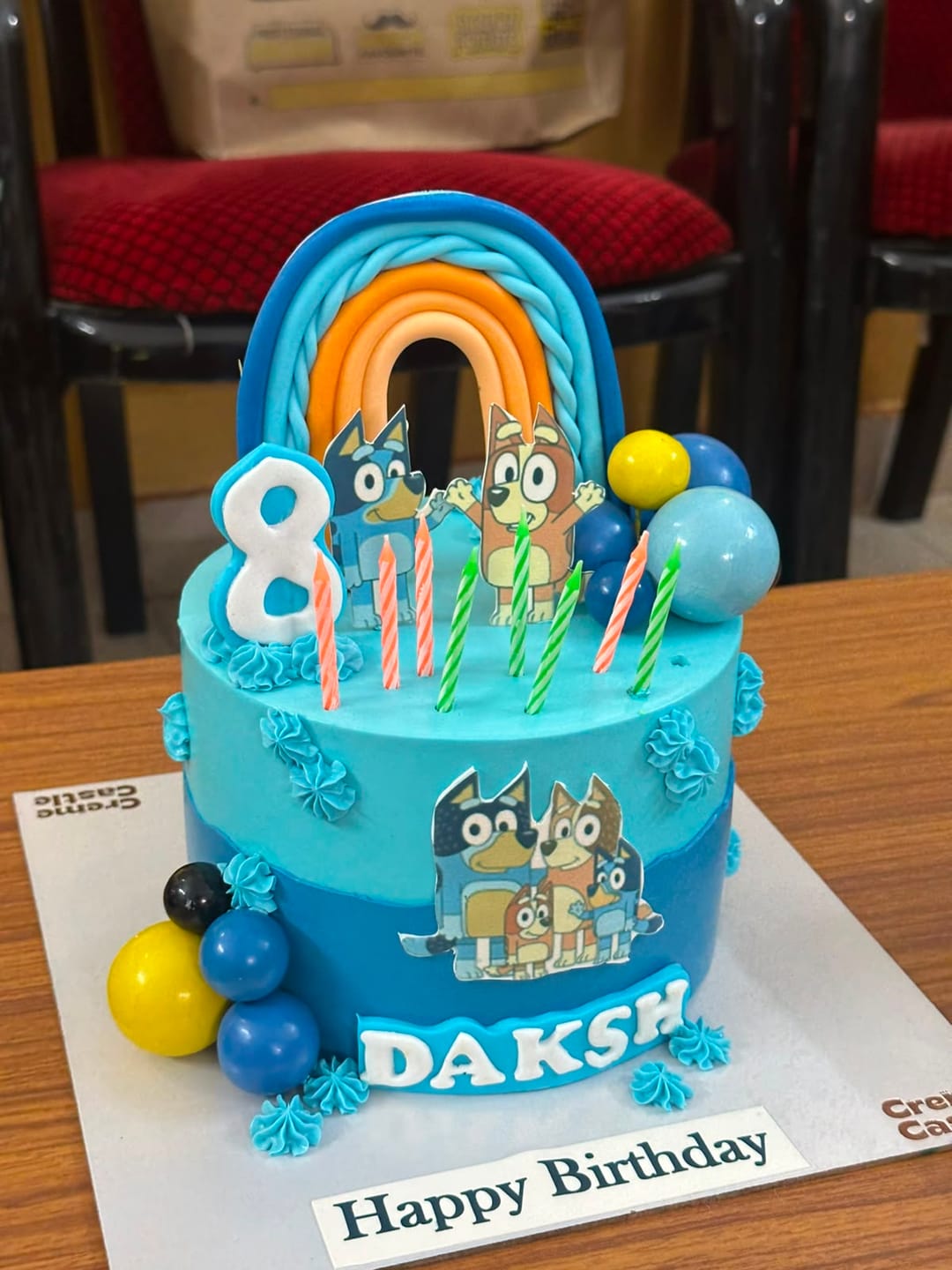 Customer photo review of Bluey Rainbow Birthday Cake