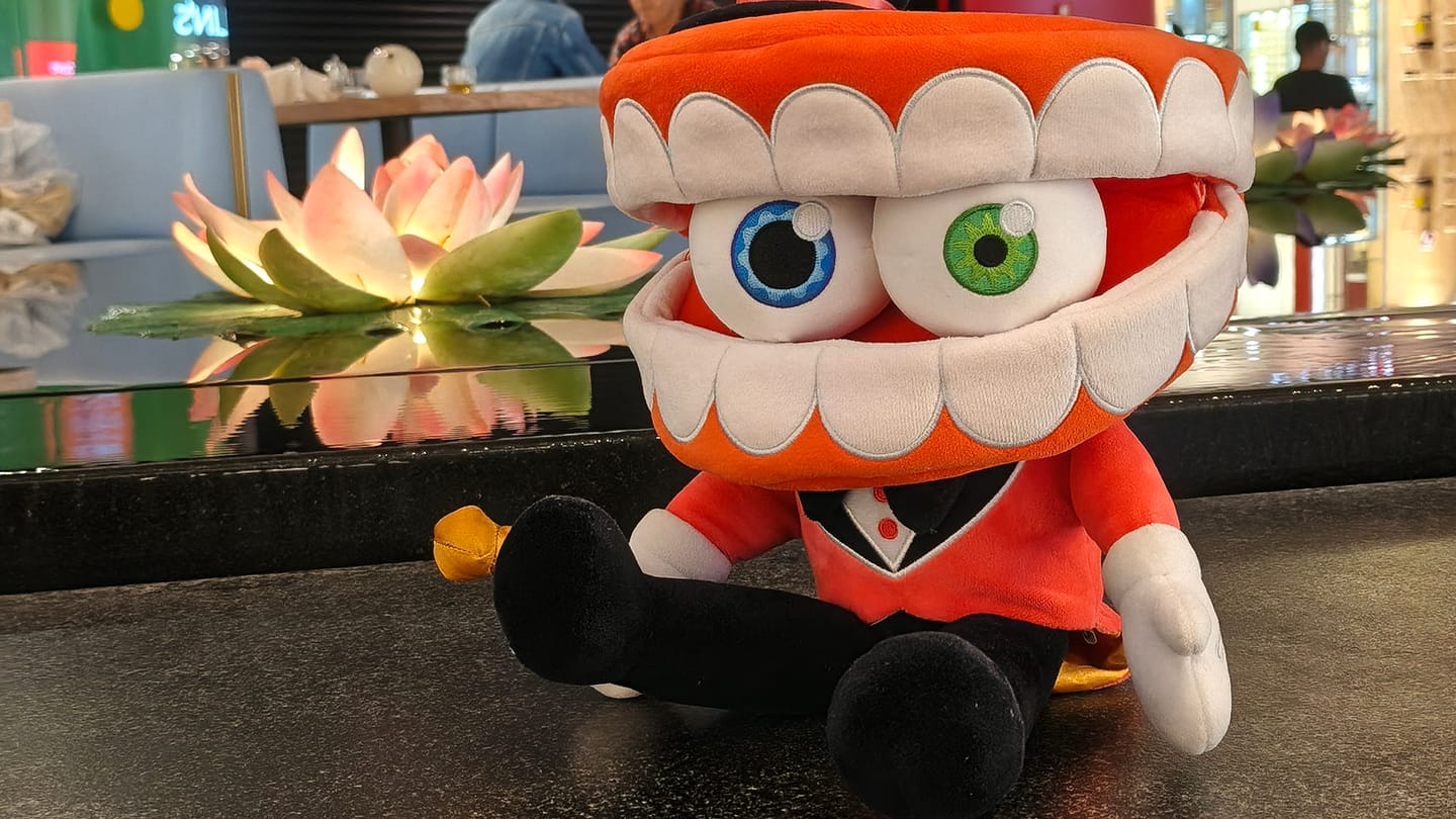 Customer photo review of Caine Puppet Plush