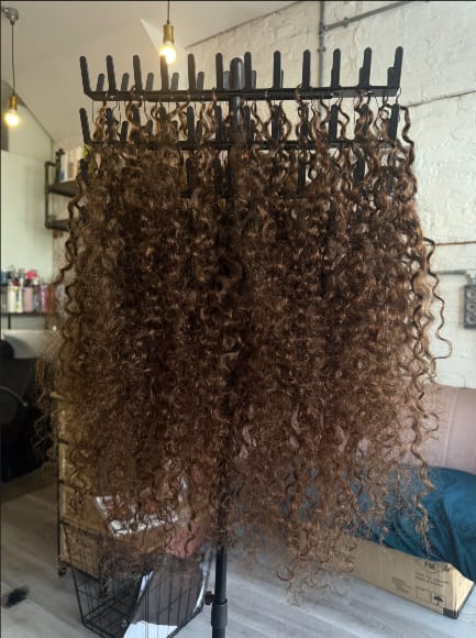 Customer photo review of Wavymy Chocolate Brown Burmese Curly Feather Crochet Human Hair Boho Braids Hair Extensions