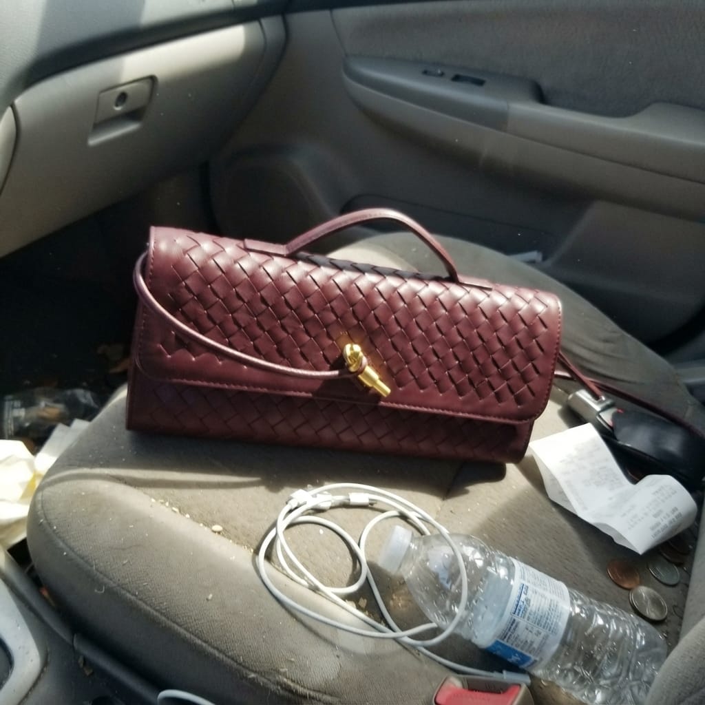 Customer photo review of Tori Black Faux Leather Woven Clutch