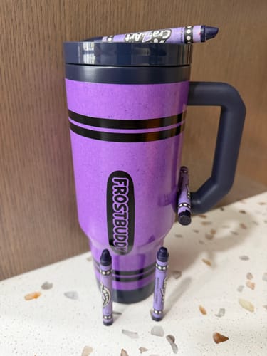 Customer's purple Thicc Buddy mug styled with matching crayon-themed details.
